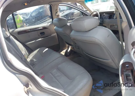 1999 Lincoln Town Car Executive из США, поврежденный, VIN 1LNHM81W7XY700940